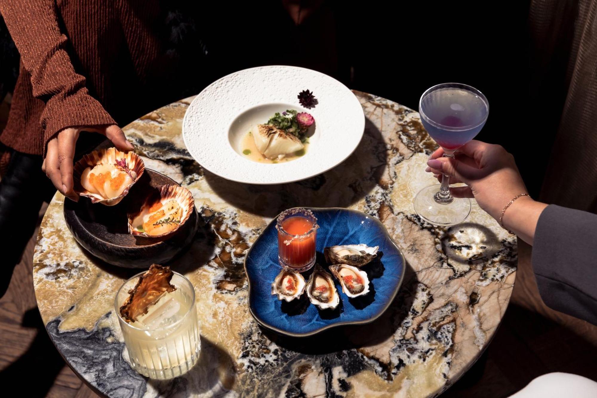 Amora Hotel Jamison Σίδνεϊ Εξωτερικό φωτογραφία A selection of dishes at the restaurant